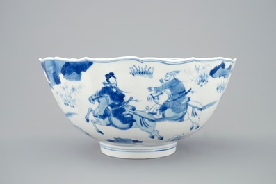 A Chinese blue and white soft paste bowl with horseriders, Kangxi
